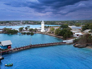 Aerial photo with a drone around the lighthouse near Waingapu harbor