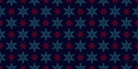 Winter seamless pattern with ornamental snowflakes. Festive geometric background texture with decorative stars, intricate line ornament. Christmas holiday design for textile, wallpaper, wrapping paper