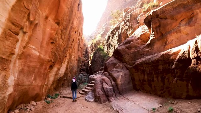 Climbing the 800 steps to reach the "high place of sacrifice" at the top of Mount Jebel Madbah, Petra, Jordan.