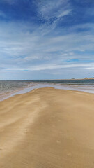 Endless shades of blue paint the horizon at Castelhanos Beach, a natural paradise on Boipeba Island, Bahia.