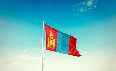 Mongolia national flag waving in beautiful sky with mast. A proud moment flag waving with sunlight.