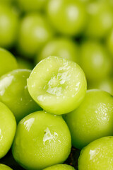 Fresh Green Seedless Grapes with Water Drops - Healthy Organic Fruit Close-up