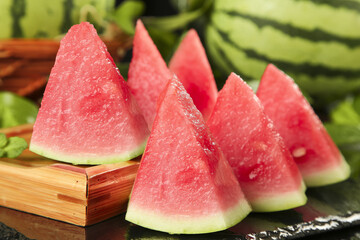 Fresh Red Watermelon Slices on Wooden Board - Juicy Seedless Summer Fruit