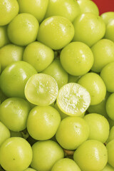 Fresh Green Seedless Grapes with Water Droplets - Healthy Organic Fruit Background
