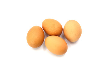 Four Chicken Eggs on White Studio Background