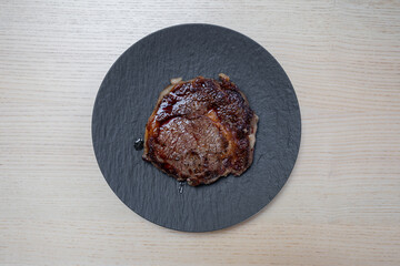 A plate of delicious freshly cooked steak.