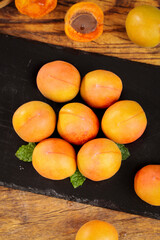 Fresh Ripe Apricots on Slate Board - Healthy Summer Stone Fruit Display