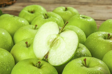 Fresh Green Apples with Water Drops on Wood Background - Healthy Fruit Photography