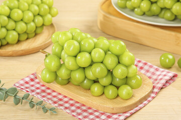 Fresh Green Grapes on Wooden Board with Sunshine - Healthy Organic Fruit Display