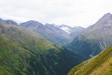 Fototapeta premium The view opening from the high hiking way from Tiefenbach glacier to Vent in Oetztal valley in the Austrian Alps 
