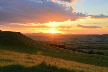 Obraz premium Sunset countryside hill sunset field grass sky cloud warm light golden hour landscape