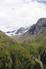 Fototapeta premium The view opening from the high hiking way from Tiefenbach glacier to Vent in Oetztal valley in the Austrian Alps 