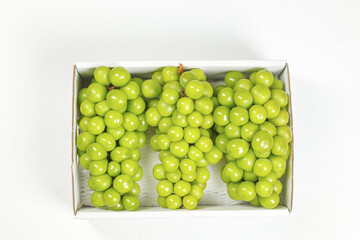 Fresh Green Grapes in White Box on Clean White Background
