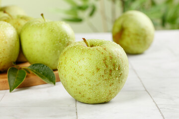 Fresh Green Apples with Water Droplets on White Wood Background - Shandong Organic Fruit