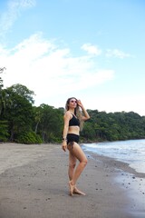 Fototapeta premium Carefree Girl Enjoying Ocean Breeze