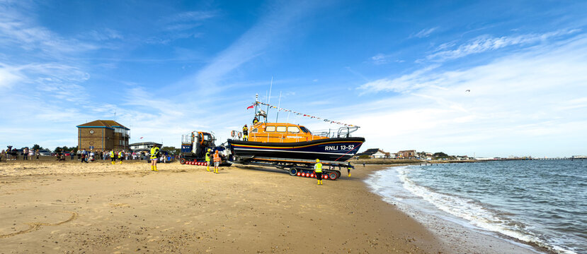 Lifeboat on rotating Beach Recovery and Launch Tractor Trailer