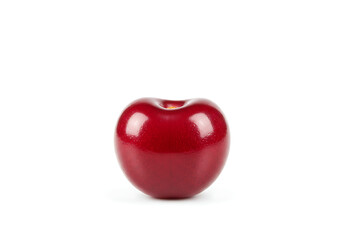 Single ripe cherry sits isolated on a white surface, showcasing its vibrant red color and smooth texture in a simple, clean presentation.