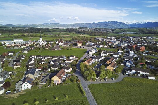 View of the village with the neighbourhood Oberdorf and the catholic parish church Mari&auml; Geburt, Sins, Freiamt, Canton, Aargau, Switzerland