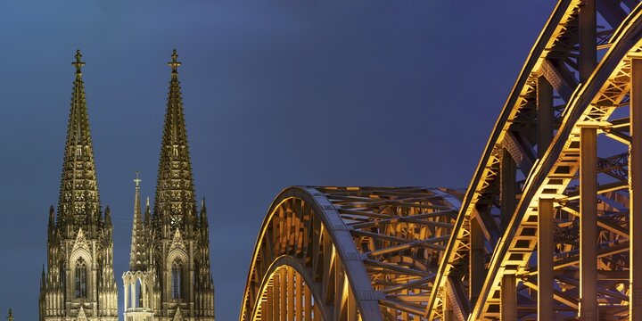 Cologne Cathedral and the Hohenzollern Bridge illuminated with LED lights, Cologne, North Rhine-Westphalia, Germany