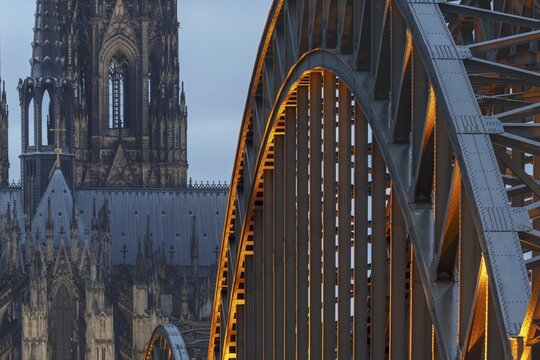 Cologne Cathedral and the Hohenzollern Bridge illuminated with LED lights, Cologne, North Rhine-Westphalia, Germany