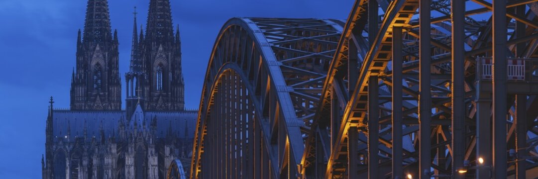 Cologne Cathedral and the Hohenzollern Bridge illuminated with LED lights, Cologne, North Rhine-Westphalia, Germany