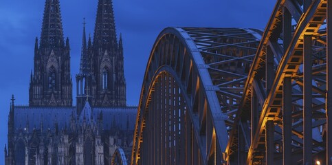 Cologne Cathedral and the Hohenzollern Bridge illuminated with LED lights, Cologne, North Rhine-Westphalia, Germany
