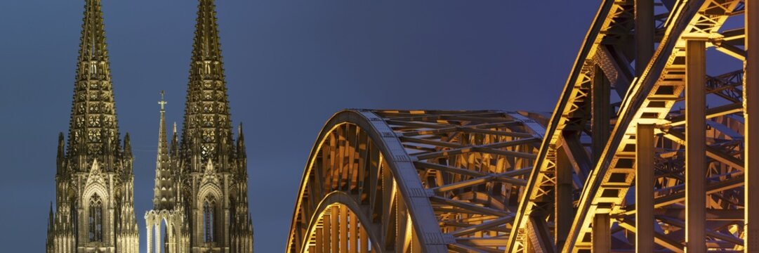 Cologne Cathedral and the Hohenzollern Bridge illuminated with LED lights, Cologne, North Rhine-Westphalia, Germany