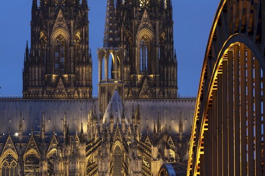 Cologne Cathedral and the Hohenzollern Bridge illuminated with LED lights, Cologne, North Rhine-Westphalia, Germany