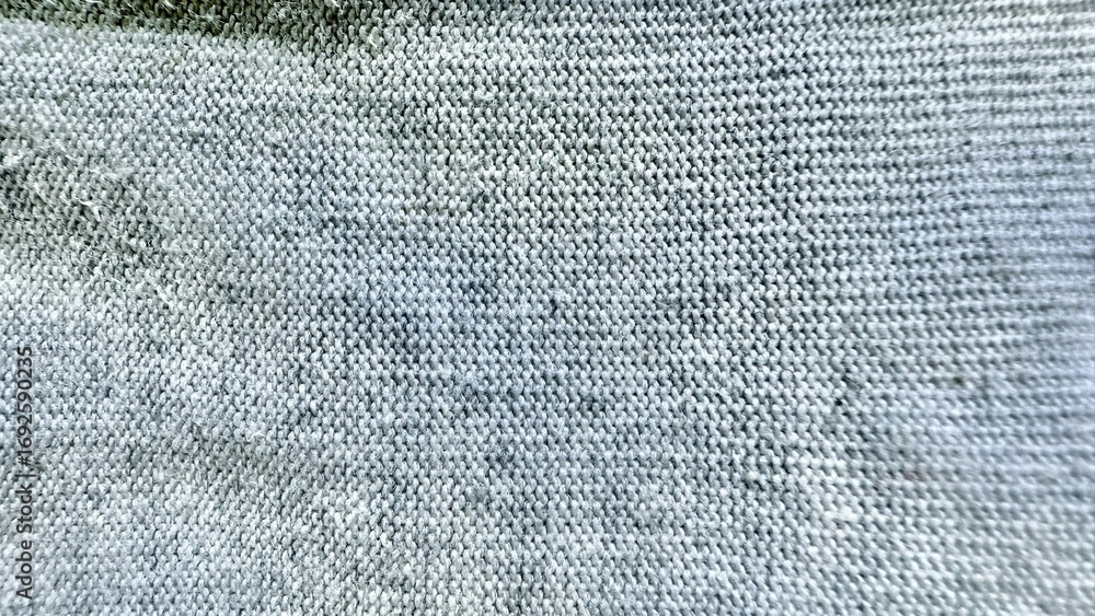Poster soft gray knitted fabric texture with subtle threads and natural folds for minimalist background wal