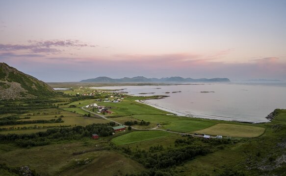 View of coastal landscape with the village of Stave at sunset, And&oslash;ya Island, Vester&aring;len, Nordland Norway