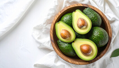 Fresh sliced avocado isolated on a white background, served on a plate