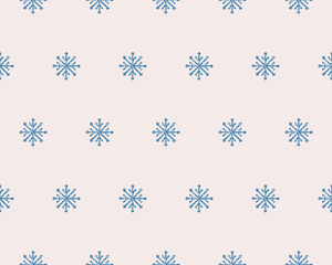 Blue distressed snowflakes seamless pattern, hand-drawn vector illustration. Rustic winter design for Christmas wrapping paper, fabric, textiles, wallpaper, seasonal cards, and digital backgrounds.