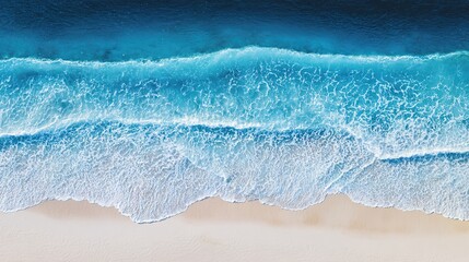 Aerial view of turquoise coastal waters with white sand, capturing the beauty of a tropical paradise.