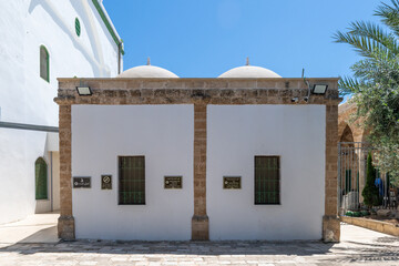 A mausoleum at the Al Jazzar Mosque in Acre, Akko's old city on a sunny day.
