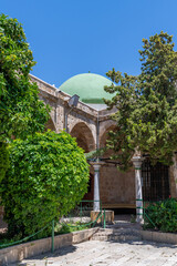 The courtyard of the Al Jazzar Mosque in Acre, Akko's old city on a sunny day.
