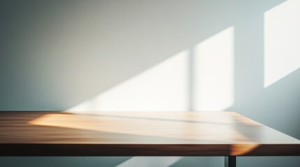 Clean wooden table with morning sunlight, subtle shadows for a minimalist productivity vibe.