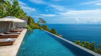 Fototapeta premium Luxury infinity pool with ocean views
