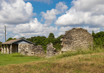 old crumbling stone wall remains from a small building
