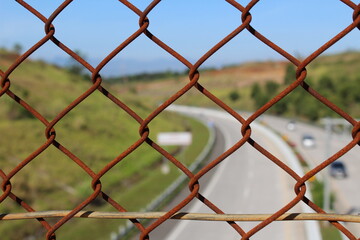 chain link fence with barbed wire