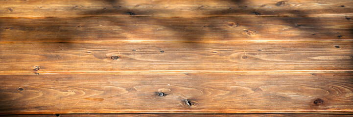 Background texture of wooden planks. Rustic horizontal wooden surface in a vintage color tone with...