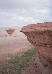 Mushroom Rocks: naturally eroded, mushroom-shaped sandstone formations, which exist in Tayma, near...