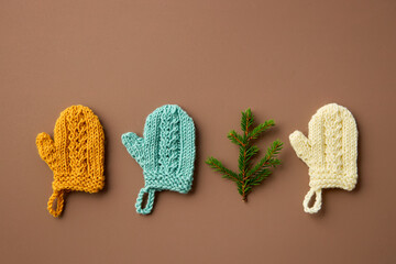 Mini Mittens Handknitted. Christmas Tree Decorations. Flat lay.