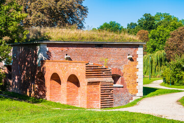 Old medieval red brick building in Zamosc city park, Roztocze region, Poland