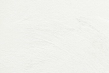 Close-up macro white concrete wall detail texture,Close-up view of a textured white concrete wall, highlighting the interplay of light and shadow on its uneven surface.