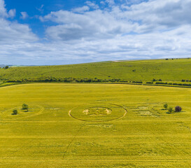 Aerial view of a mysterious, intricate, geometric crop art, crop circle formation in a barley field near Sutton Veny, Wiltshire, England, UK 