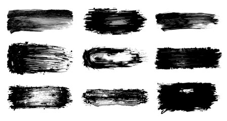 Set of monochrome brushstrokes in black and white