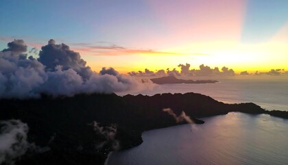 Aerial view of a dramatic sunset over a coastline