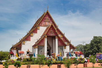 Grand Thai temple against blue sky - The majestic temple of Wat Phra Ram in Ayutthaya with its...