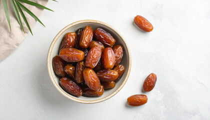 Close-up shot of a bowl filled with delicious, sweet, and ripe dates, ready to eat.