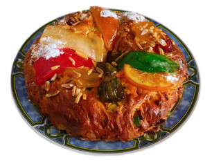 Portugal. Typical Portuguese Christmas cake known as Bolo Rei - King's Cake. Eaten during the Christmas holidays, but traditionally on the 12th day of Christmas. On decorative plate isolated on white